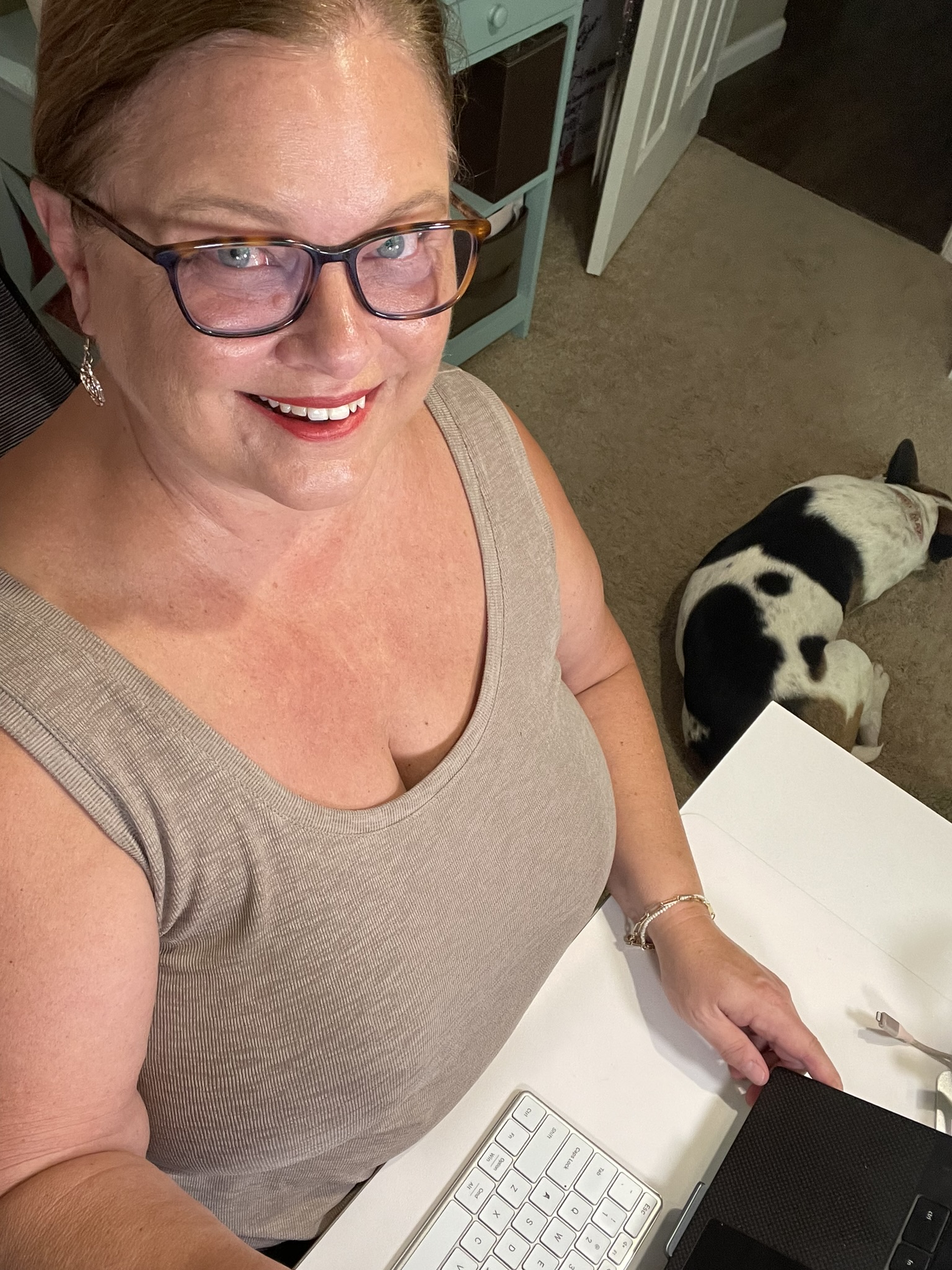 Michele jokes that her office
	companion and big dog Max
	has the home title Head of Security