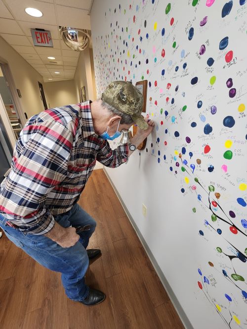 Rebecca’s husband, Ross, got to sign the wall
at the radiology center when he completed
his final treatment in San Antonio. Copywriting
allowed Rebecca to take him to every treatment
and live in a hotel for months.